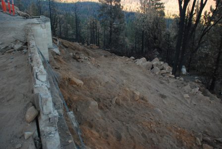 Image of foundation wall with clean dirt at its base