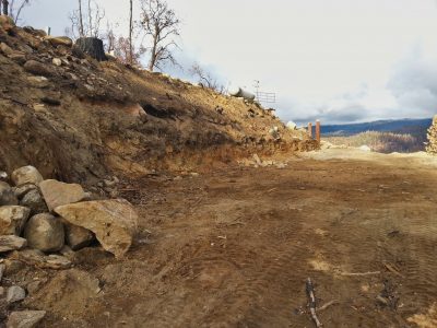 Image of the cleared building site, now without woodpiles