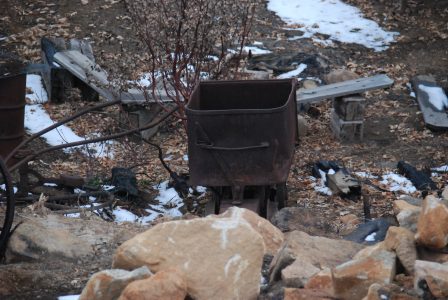 Image of an ore car among rocks